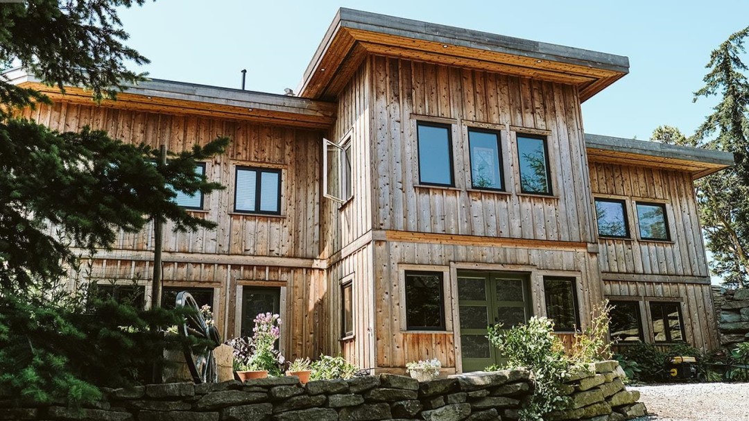 Home on the Pacific coast with wood panel siding