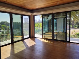 Sliding Glass doors connecting the space to the Hawaiian weather