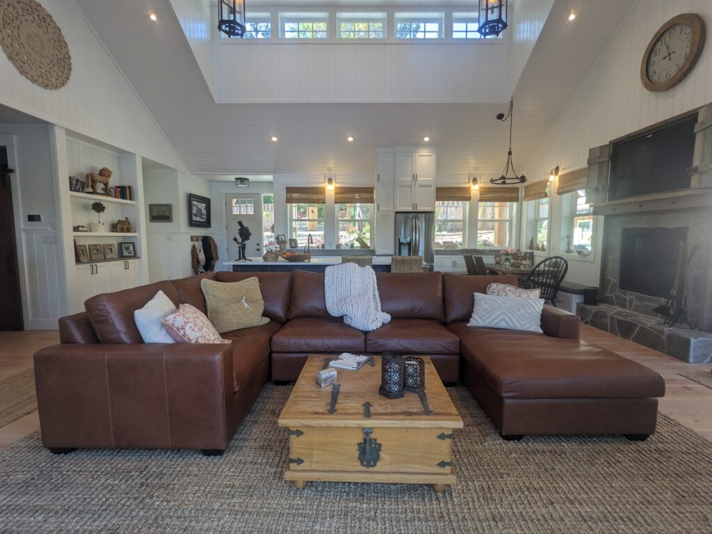 Interior shot of the home's great room, highlighting its vaulted ceilings