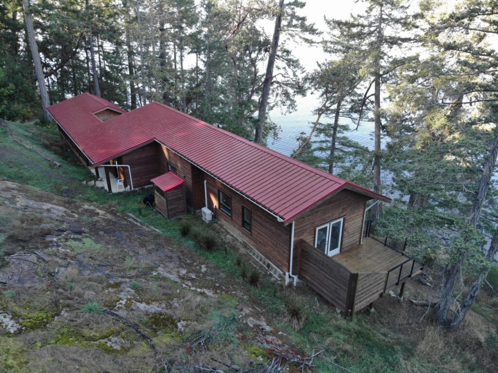 Side view of the prefab cabin in BC, Canada, showcasing the master suite's private deck