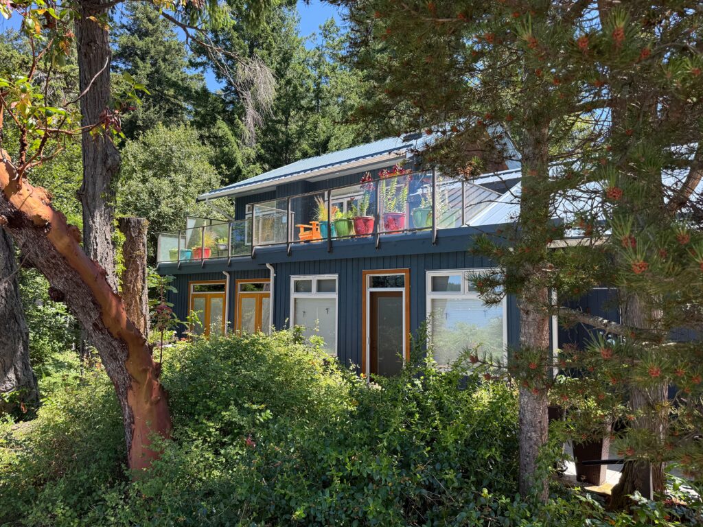 A showcase of the addition's second floor deck that overlooks the ocean