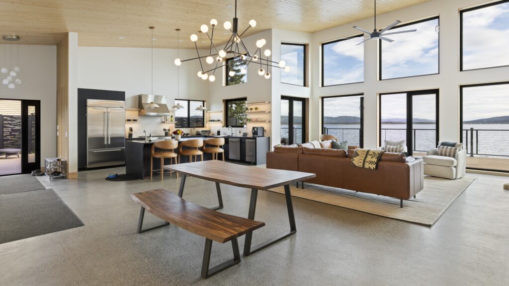 An open concept living space combining a kitchen, dining room and living room