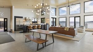 An open concept living space combining a kitchen, dining room and living room