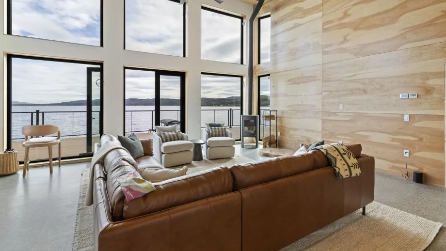 Expansive living space with lakefront views