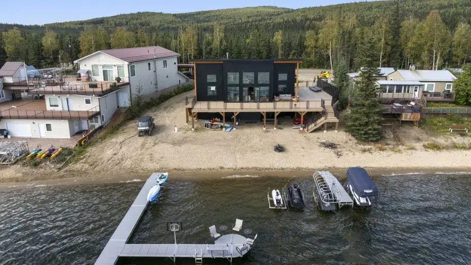 View of the custom home in Alaska taken from the lake