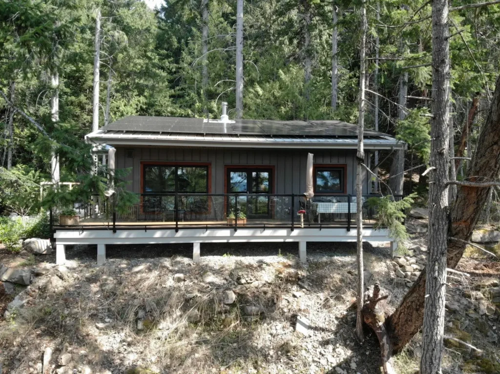 This cabin's wrap-around deck allows homeowners to enjoy the beautiful weather