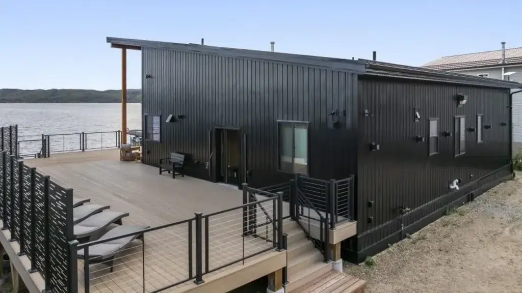 Modern lakeside house with an expansive deck