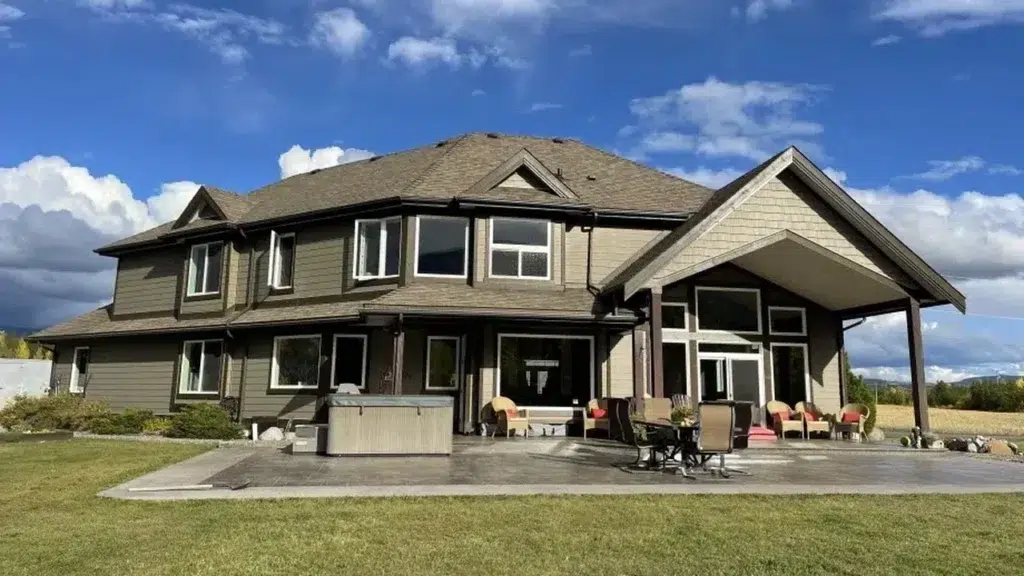 A custom house plan on display with this spacious family home