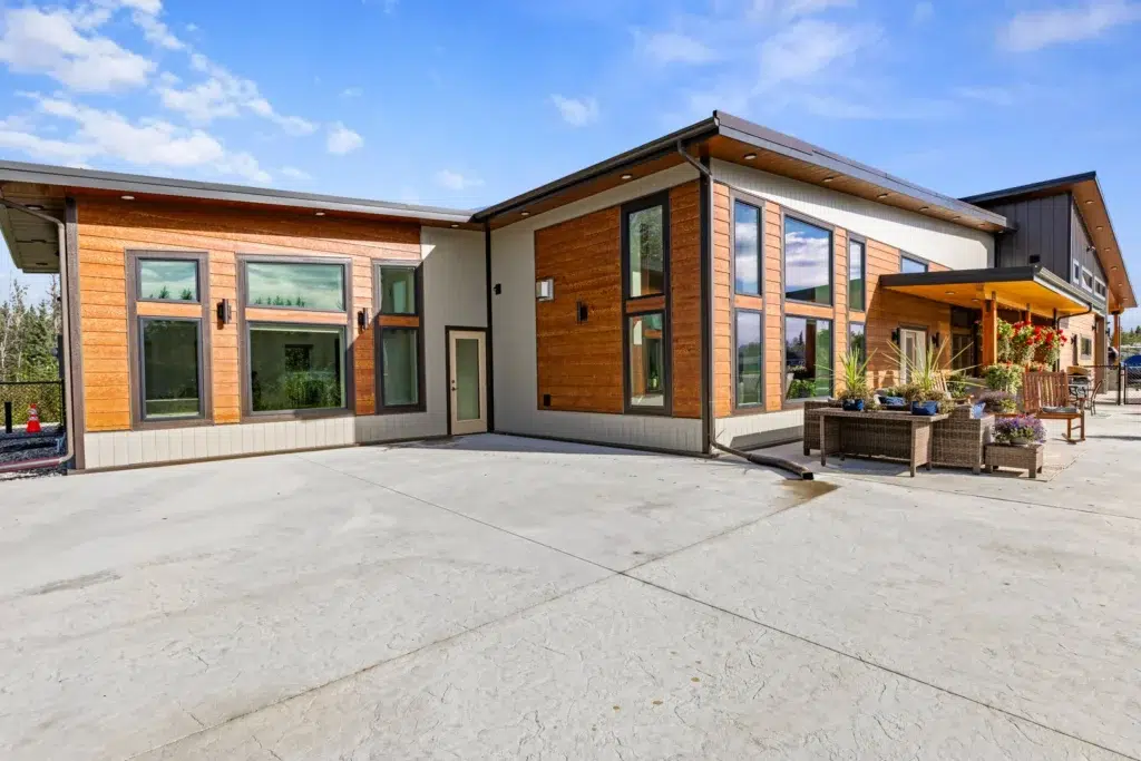 This home's striking features and color choices give it outstanding curb appeal